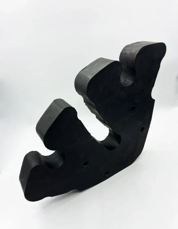 Atlas Copco Epiroc Segment 3128307471 rod-separating block for Simba H1354, featuring a metal core with rubber-carbon coating, designed for underground mining rigs